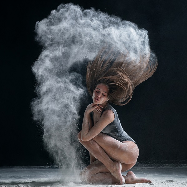 female dancer posing on studio background